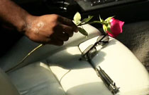Gallery image from movie. A rose and a knife.
