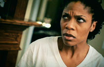 Gallery image from movie. A woman looking upset.