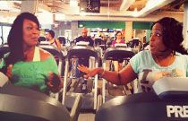Erica and her friend hang out at the gym.