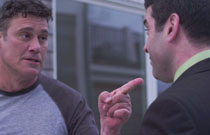 Gallery image from movie. Steven Bauer pointing at someone.
