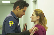 Gallery image from movie. A man consoling a woman.