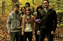 Gallery image from movie. A group of kids in the woods.