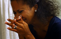 Gallery image from movie. A woman is crying.