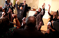 Church choir sings.